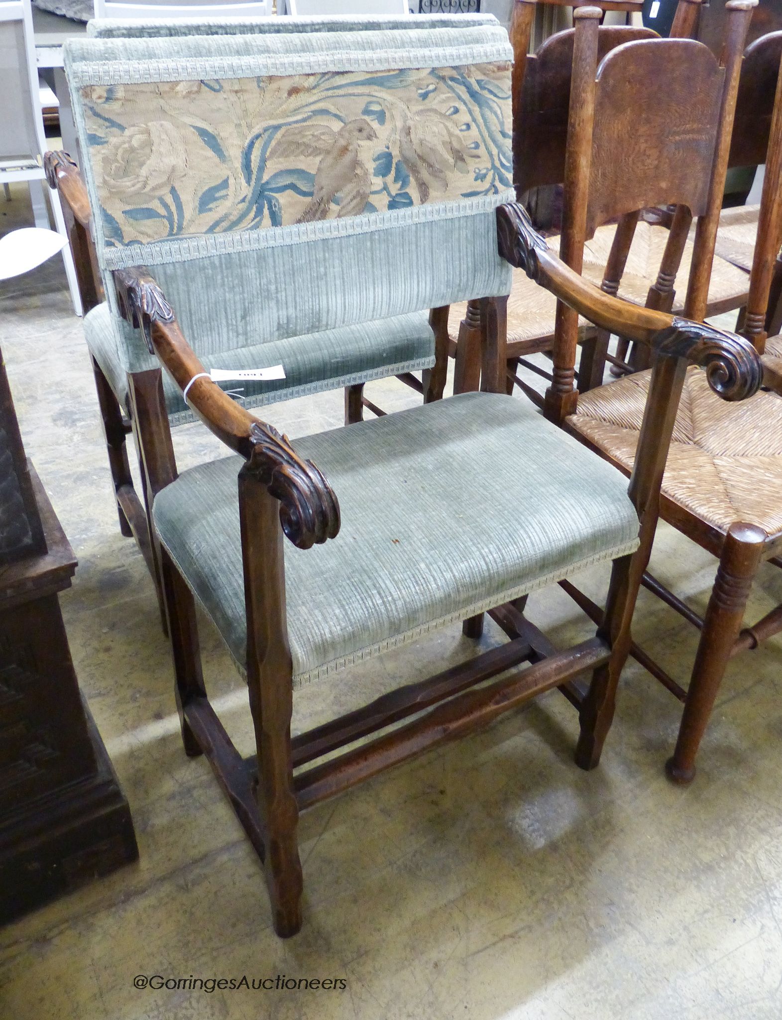 A pair of 18th century French walnut armchairs.